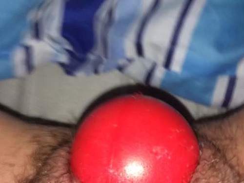 Huge red ball fully into hairy cunt POV video